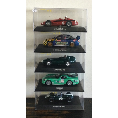 356 - SCALEXTRIC: Five various boxed model racing cars. Est. £20 - £30.