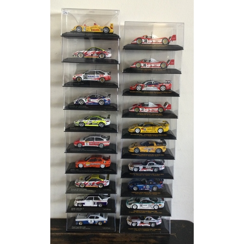 374 - Twenty various boxed model racing cars. Est. £20 - £30.