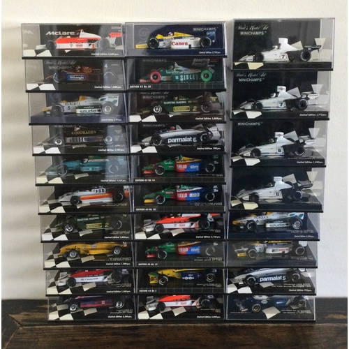 375 - MINICHAMPS: Twenty-four various boxed model racing cars. Est. £20 - £30.