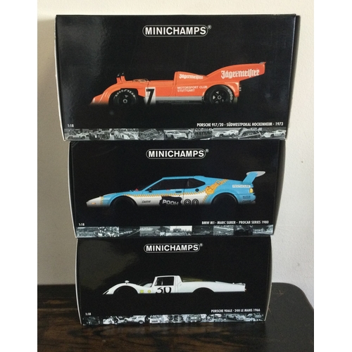 379 - MINICHAMPS: Three various boxed model racing cars, scale 1:18. Est. £20 - £30.