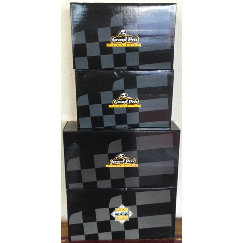 587 - GRAND PRIX CLASSICS: Four various 1:18 scale boxed model racing car set. Est.£30 - £40.