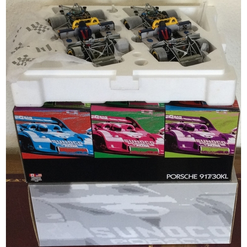 589 - EXOTO: A large boxed 1:18 scale Porsche 917 racing car set. Est. £80 - £120.