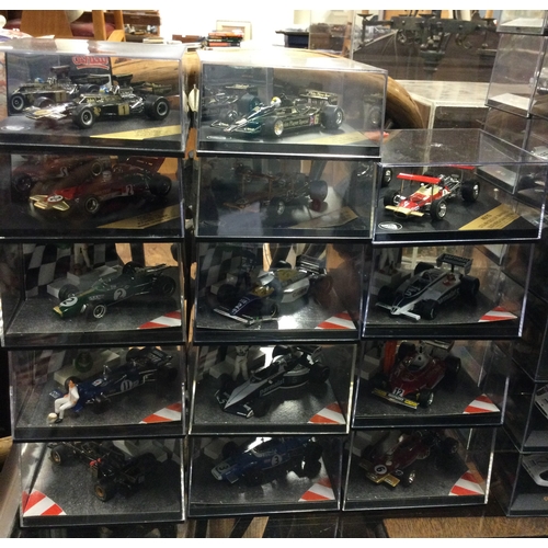 367 - QUARTZO: Sixteen various boxed model racing cars. Est. £20 - £30.