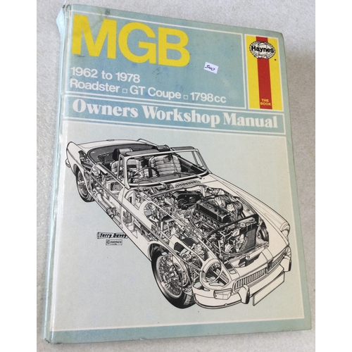 340 - A selection of various motoring books and manuals. Est. £15 - £20.