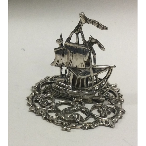 111 - A heavy cast silver menu holder in the form of a ship. London. Approx. 39 grams. Est. £30 - £50.