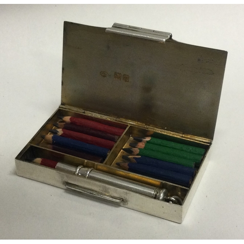 113 - An attractive hinged top silver box mounted with miniature pencils. Birmingham. Approx. 52 grams gro... 