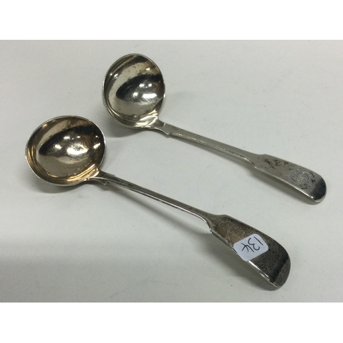 134 - EXETER: Two silver cream ladles. Approx. 38 grams. Est. £20 - £30.