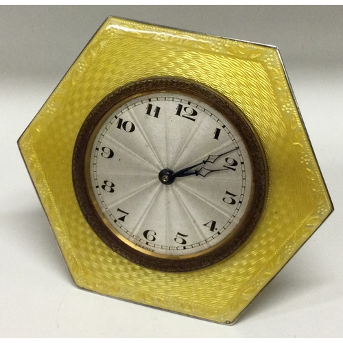 136 - A good Victorian silver and yellow enamelled desk clock. Birmingham 1900. By M Bros Ltd. Approx. 119... 