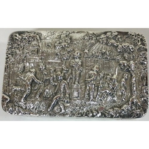 137 - A finely chased Victorian silver snuff box embossed with musicians. bearing import marks. Sheffield ... 