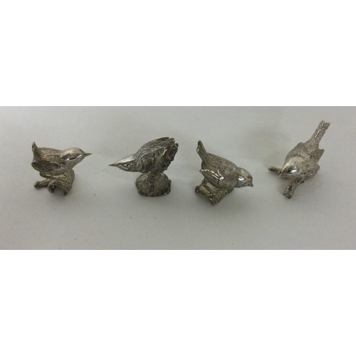 139 - A set of four cast silver bird menu holders. London 1986. Approx. 122 grams. Est. £300 - £500.