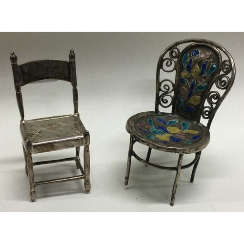 173 - Two novelty silver table toys in the form of chairs. Approx. 25 grams. Est. £30 - £50.