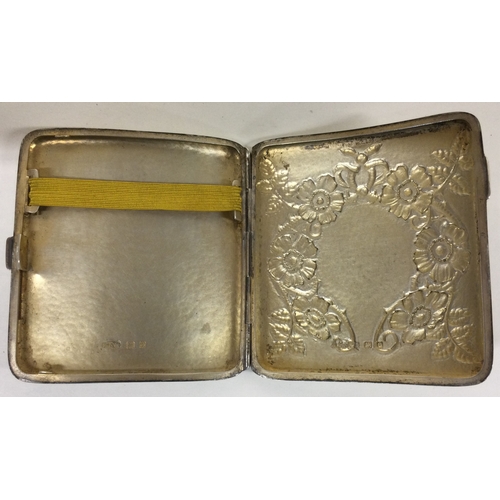 176 - A fine chased silver cigarette by Ramsden and Carr. London 1909.  Approx. 101 grams. Est. £800 - £10... 