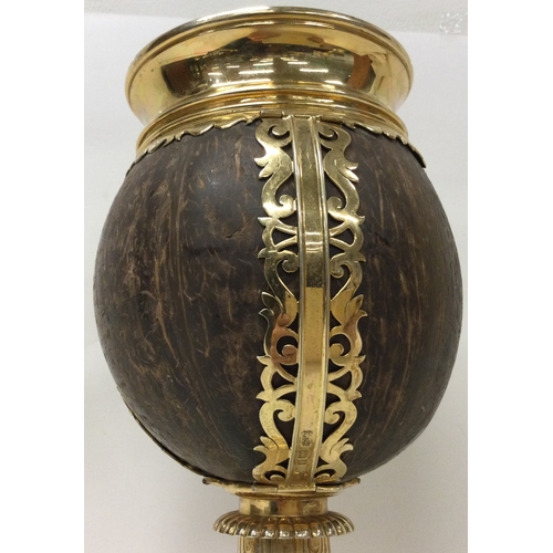 190 - A very rare oversized silver gilt coconut presentation cup. London 1928. By Cohen and Charles. Appro... 