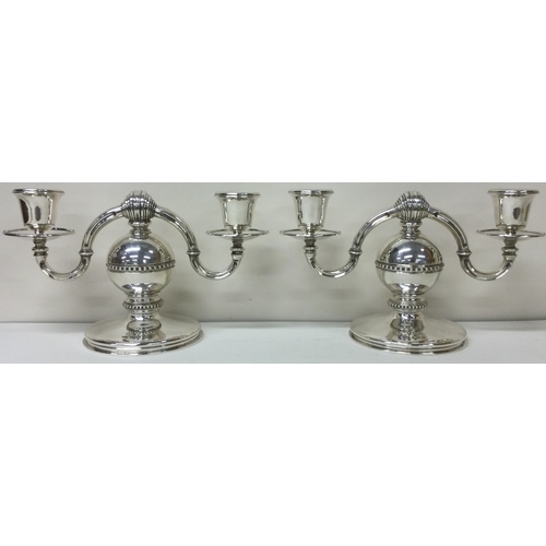 191 - A heavy and decorative pair of silver candelabras. Birmingham 1970. By AJA. Approx. 1819 grams. Est.... 