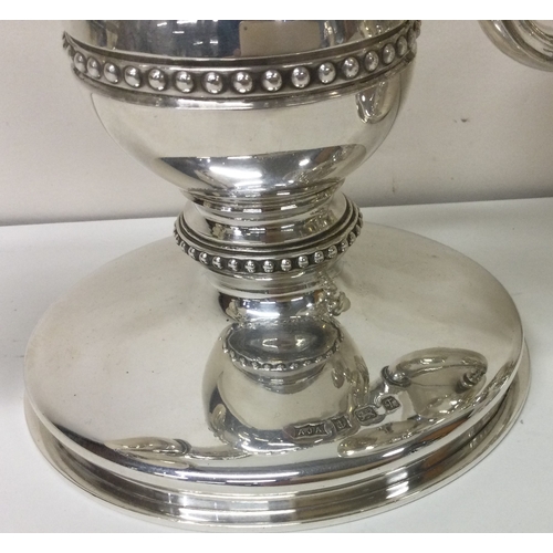 191 - A heavy and decorative pair of silver candelabras. Birmingham 1970. By AJA. Approx. 1819 grams. Est.... 