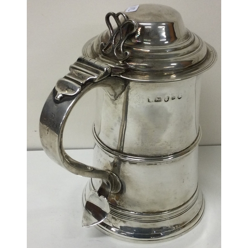 192 - A George III 18th Century silver lidded tankard. London 1793. By George Burrows. Approx. 684 grams. ... 