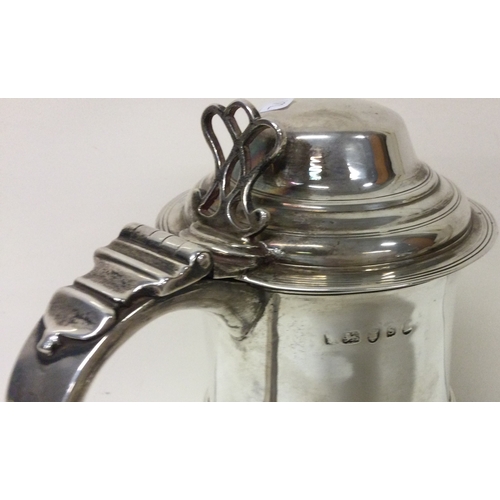 192 - A George III 18th Century silver lidded tankard. London 1793. By George Burrows. Approx. 684 grams. ... 