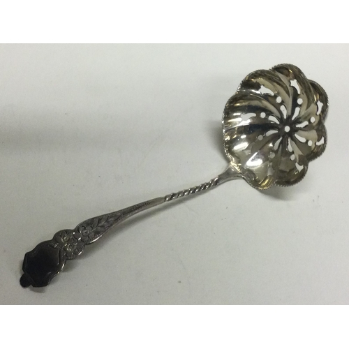 199 - An attractive silver sifter spoon with floral decoration. Birmingham. Approx. 11 grams. Est. £100 - ... 