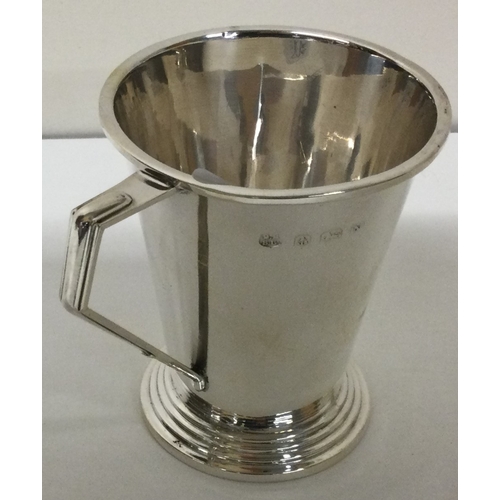 204 - A novelty silver christening mug. Birmingham 1937. By Barker Brothers. Approx. 67 grams. Est. £60 - ... 