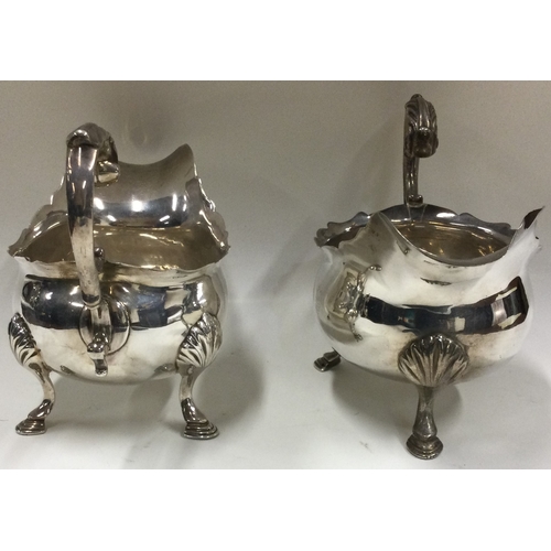 224 - HESTER BATEMAN: A rare pair of 18th Century crested silver sauce boats. London 1787. Approx. 325 gra... 