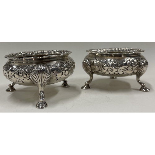 246 - EDINBURGH: A fine pair of chased silver table salts. 1912 By Mackay and Chisholm. Approx. 182 grams.... 