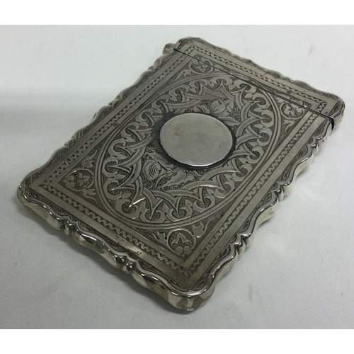 252 - A good Victorian silver card case with engraved decoration. Approx. 52 grams. Est. £40 - £60.