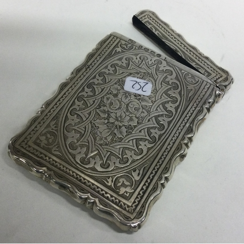 252 - A good Victorian silver card case with engraved decoration. Approx. 52 grams. Est. £40 - £60.