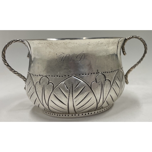 266 - A fine Edwardian silver porringer in the style of Charles II. London 1913. Approx. 79 grams. Est. £8... 