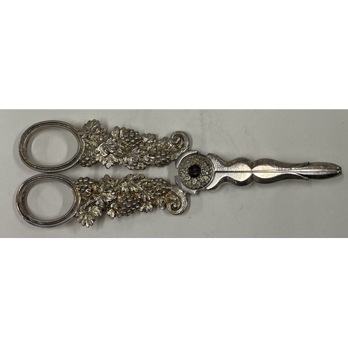 270 - A fine silver gilt pair of grape scissors heavily embossed with vines. London 1826 by Charles Rawlin... 