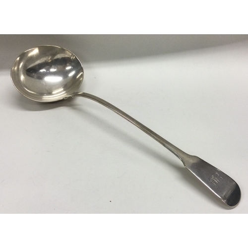 277 - A heavy fiddle pattern silver soup ladle. London. By WE&WF. Approx. 192 grams. Est. £100 - £200.