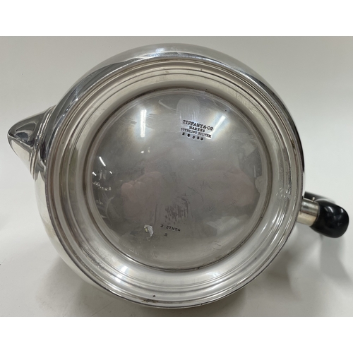 28 - TIFFANY & CO: A large silver teapot. Approx. 917 grams. Est. £600 - £800