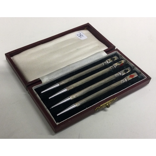 281 - A set of four silver bridge pencils. Approx. 23 grams. Est. £60 - £80.