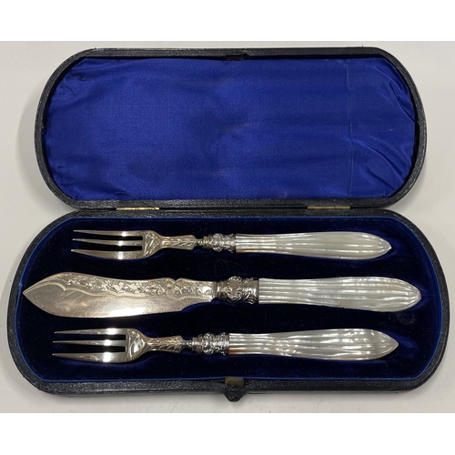 29 - A fine three piece Victorian silver and MOP cased sardine set. Birmingham 1875. By George Unite. App... 