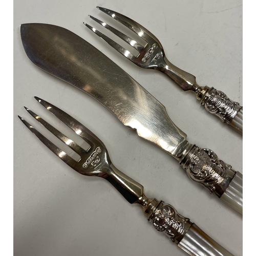 29 - A fine three piece Victorian silver and MOP cased sardine set. Birmingham 1875. By George Unite. App... 