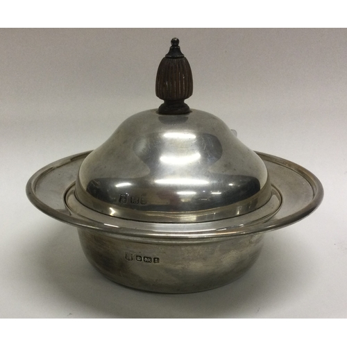 295 - An attractive silver mounted butter dish. Sheffield. Approx. 131 grams. Est. £40 - £60.