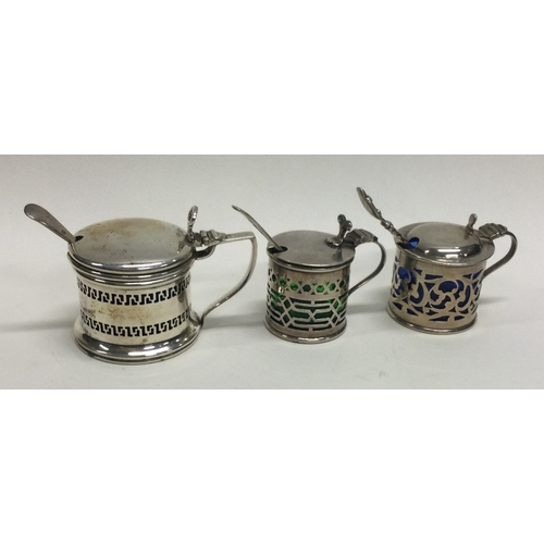 3 - A group of three silver mustard pots. Various dates and makers. Approx. 85 grams. Est. £30 - £40.