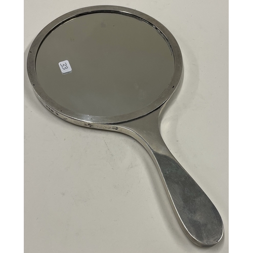 33 - A large silver and enamelled mirror. London 1959. Approx. 315 grams gross weight.  Est. £150 - £200.