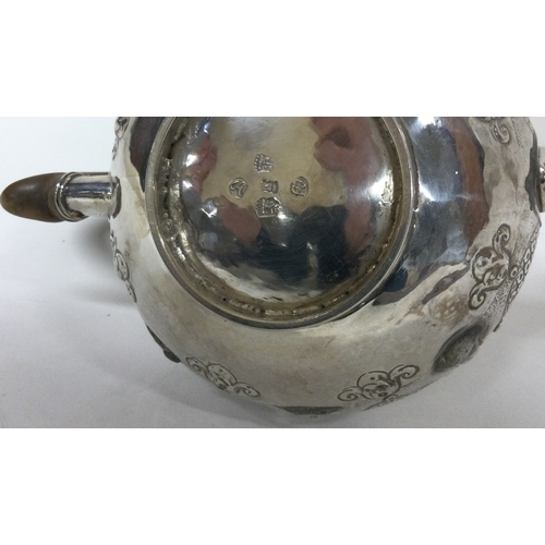 49 - An early chased 18th Century Dutch chased teapot. Approx. 284 grams. Est. £800 - £1000.