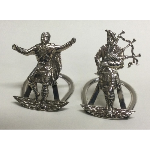 62 - A pair of heavy silver menu holders. Birmingham. Approx. 31 grams. Est. £30 - £50.