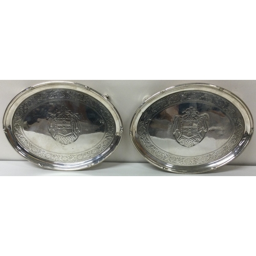 67 - A pair of Georgian 18th Century silver salvers bearing coat of arms. London 1793. By John Schofield.... 