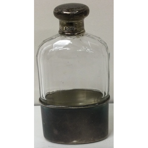 68 - A silver mounted flask. Birmingham. Approx. 56 grams gross weight. Est. £60 - £80.