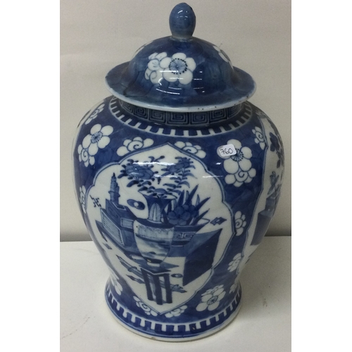 760 - A good Chinese blue and white vase with lift of cover. Signed to base. Est. £50 - £80.