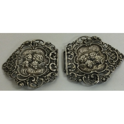 85 - A pair of heavy Victorian silver buckles embossed with cherubs. Birmingham 1899. Approx. 64 grams. E... 