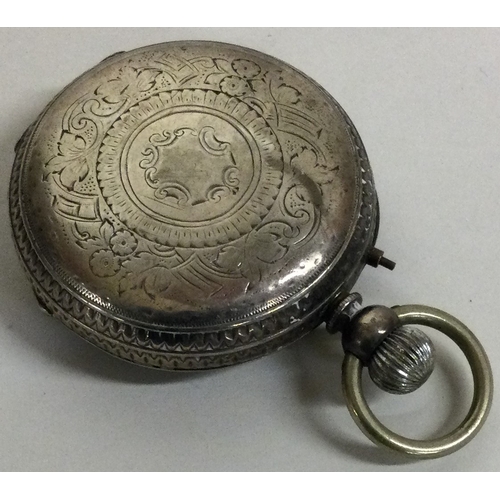 90 - A chased silver pocket watch. Approx. 82 grams. Est. £30 - £50.