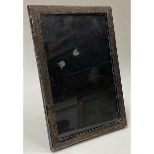 99 - A silver photo frame. Birmingham 1927. Est. £40 - £60.