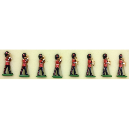 26 - BRITAINS: A set of eight painted soldiers. Est. £20 - £30.