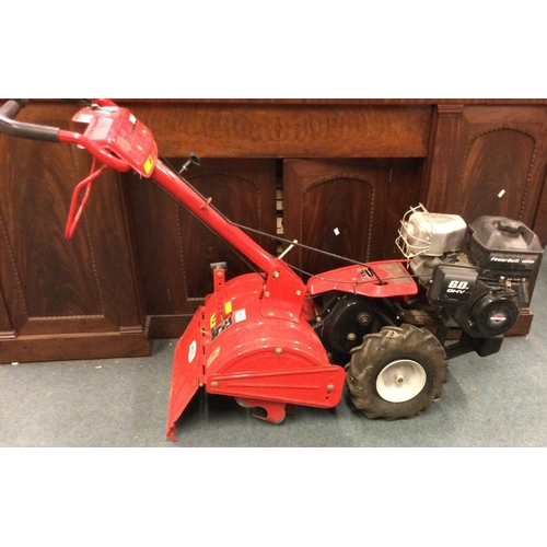 843 - An MTD petrol rotavator. Est. £250 - £300.