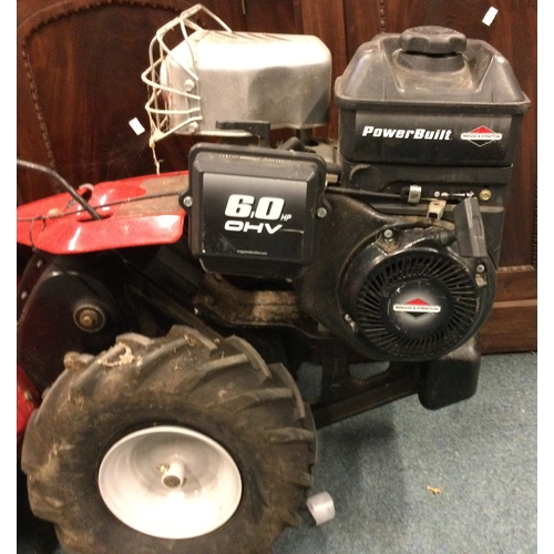 843 - An MTD petrol rotavator. Est. £250 - £300.