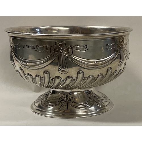 A chased silver bowl embossed with swags. Sheffield 1904. By Mappin