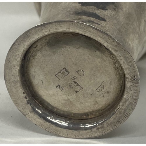 10 - An early 18th Century Continental silver beaker with engraved floral design. Marked to base. Approx.... 